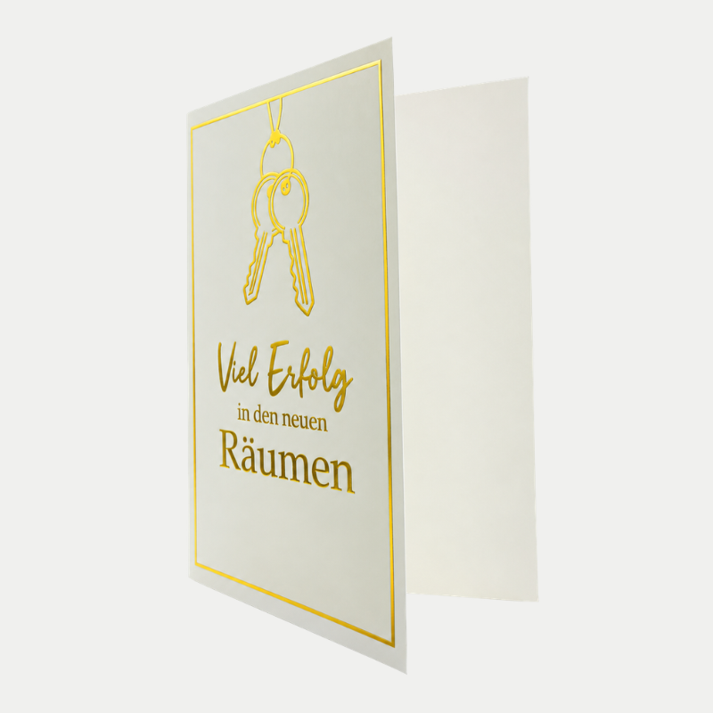 Glückwunschkarte Geschäftseröffnung mit goldfarbenen Schlüsseln und Schriftzug Viel Erfolg in den neuen Räumen